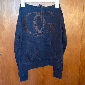 OBEY sweatshirt with cheetah print lettering. Size small.